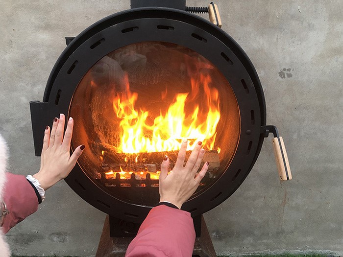 suspended wood fireplace
