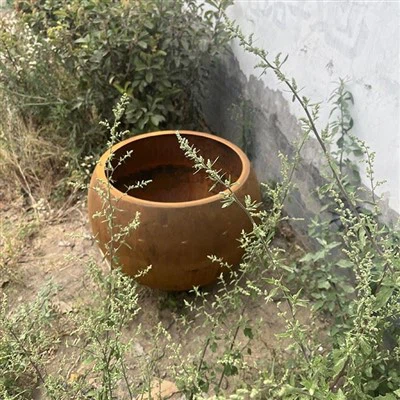 Moderne plantekasse i Corten stål